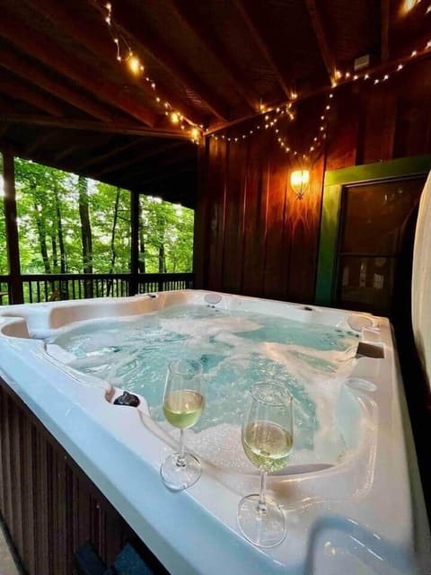 Have a glass of wine and enjoy the hot tub! This hot tub has epic views!