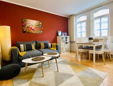 Cozy living room with sofa bed, dining area & Smart-TV