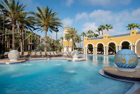 Soak up sunshine by the palms and refreshing pool.