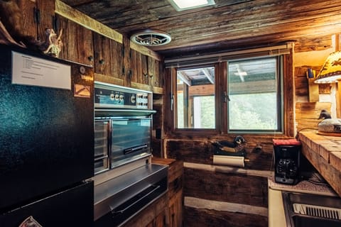 Full kitchen with stove, microwave, dishwasher & fridge
