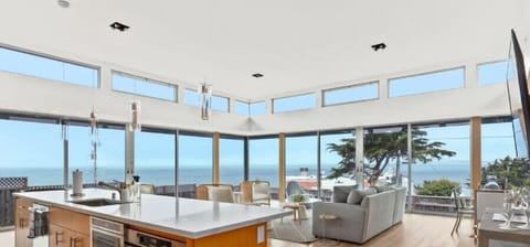 Enjoy the stunning ocean views from multiple vantage points throughout the home! This modern home in Moss Beach is the perfect choice for a peaceful getaway or an adventure-filled coastal retreat ✨