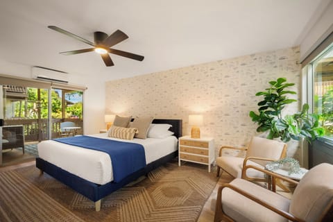 Large king bed with super comfortable memory foam mattress and chairs to relax.