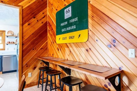 Rustic charm awaits at this inviting bar-top seating, perfect for morning coffee!