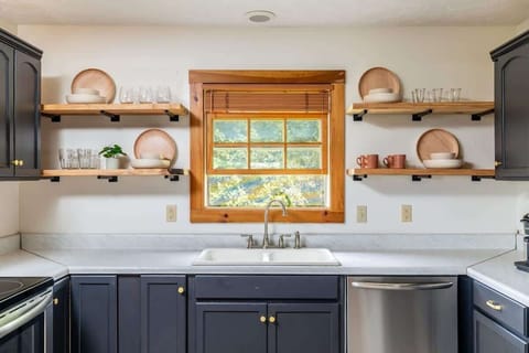 Upstairs, Just off of the dining room you will have a fully stocked kitchen ready to help you serve your crew.