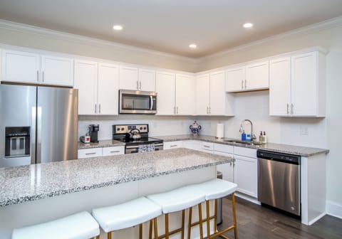Kitchen and island with 4 bar stools