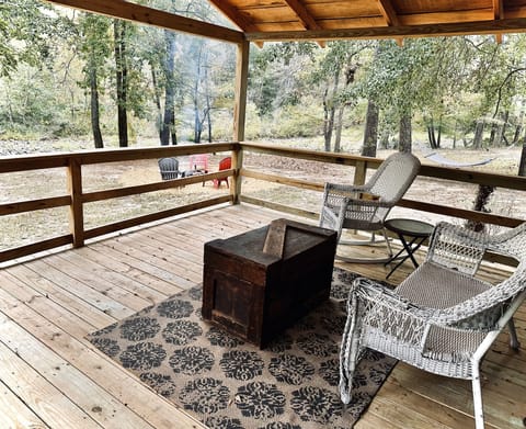 Large covered deck overlooking Little River