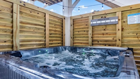 Private hot tub w/lights is part of the fun and relaxation on the ground floor.