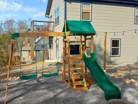 Swinging, sliding, and climbing...this is the perfect cabin for the kids!