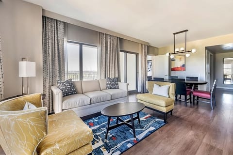 Lounge together in a spacious living area with stylish seating.