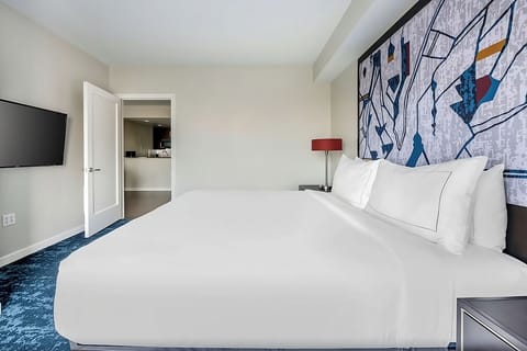 Wake up to daylight and a serene view beyond the glass.