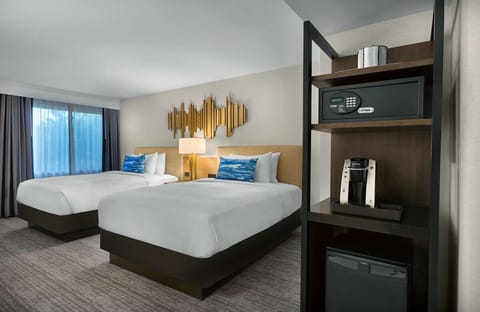 Unit with 2 Queen beds. Exact unit will be assigned upon arrival. Views, colors, and decor may vary.