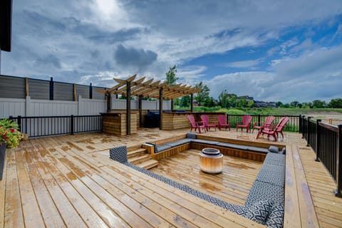 35x40 deck includes inground lighting, solo stove fire pit and 3 BBQs. 