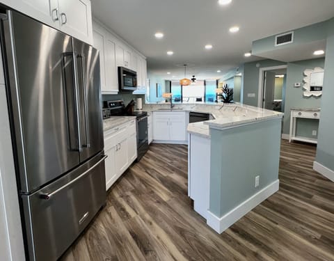 Another angle of the completely remodeled kitchen- this side ove - Another angle of the completely remodeled kitchen- this side overlooks the beach and Gulf of Mexico.