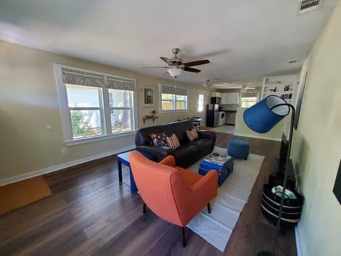 Open concept living room, dining and kitchen.