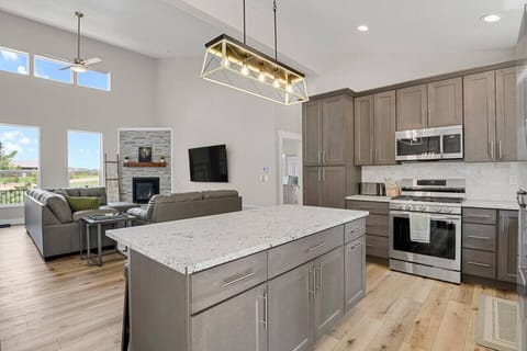 Open Concept from Stocked Kitchen to Living Room