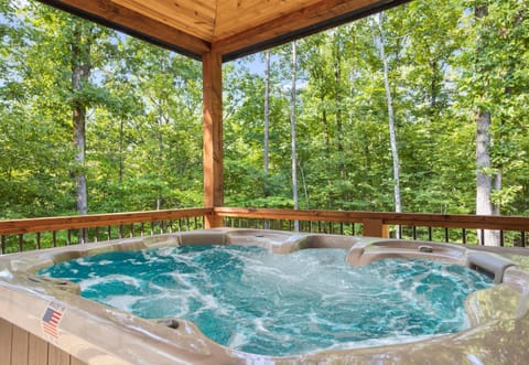 Soak your cares away in the hot tub while surrounded by the tranquility of the forest.