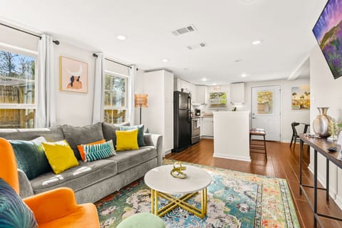 Spacious living room and kitchen for the family to enjoy watching movies or cooking a nice meal.