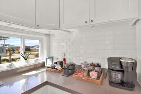 Enjoy making breakfast with this complimentary waffle and coffee bar.