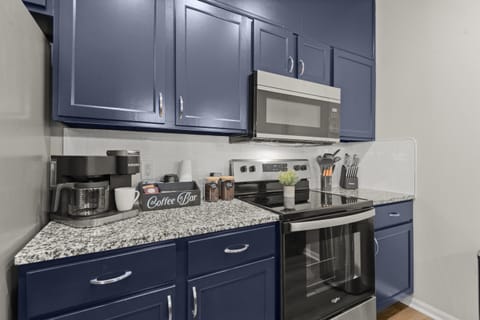 Wake up to a fully stocked coffee bar-pods, ground coffee, whole bean, grinder, sweeteners and creamer.