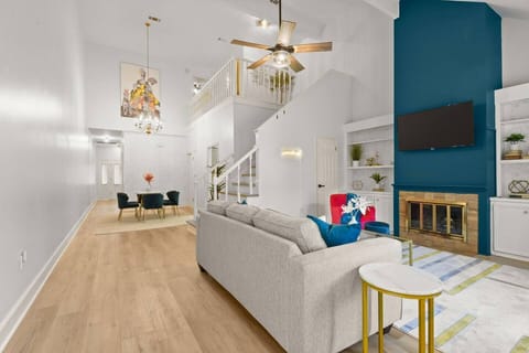 Make a grand entrance into the vaulted open concept space from your gated patio area & enclosed garage.