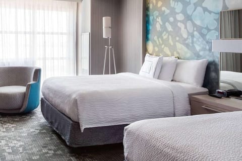 Unit with 2 Queen beds. Exact unit will be assigned upon arrival. Views, colors, and decor may vary.