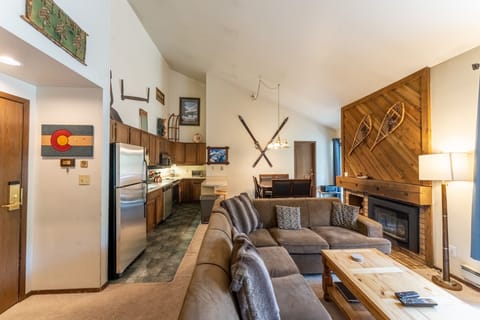 Open concept kitchen, dining and living area.