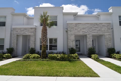 Stylish modern exterior with parking in front of the home
