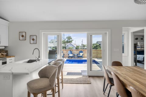 Kitchen Dining opens up to Outdoor Saltwater Plunge Pool