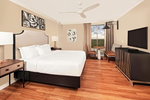 Relax in a spacious king room with scenic outlook.