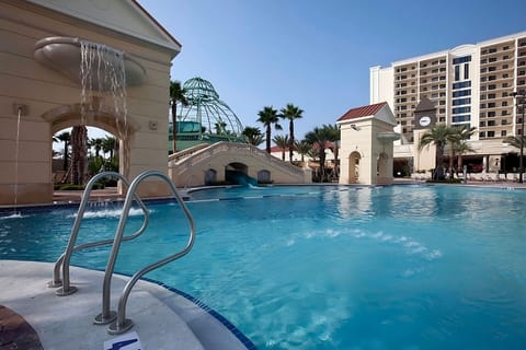 Cool off with sparkling water and resort architecture all around.