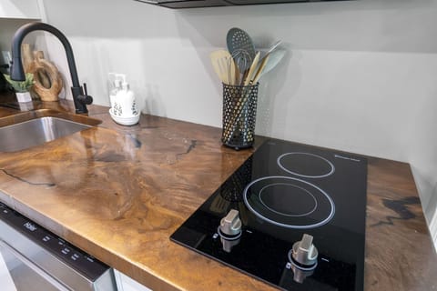 Your stovetop. We provide basic seasonings as well as cooking oil.