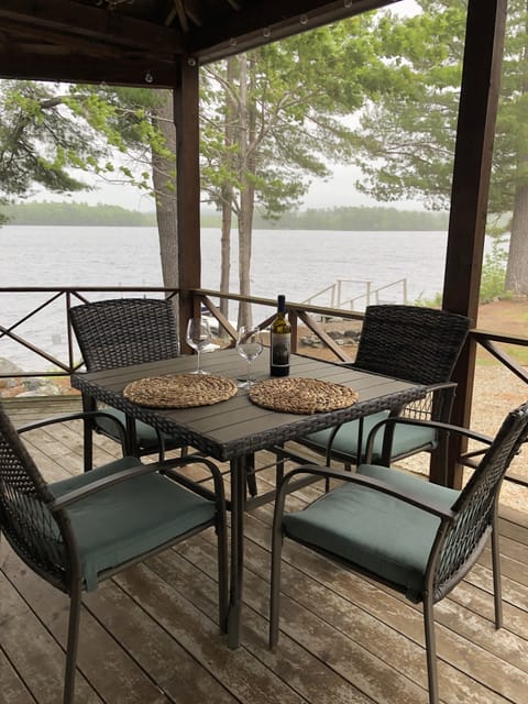 Dining area on screened in porch.