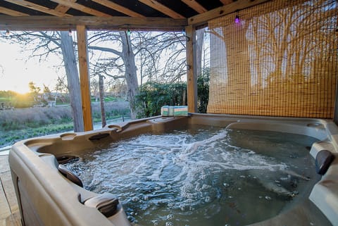 Relax in the hot tub with a view