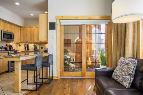Sliding glass doors lead out onto the deck