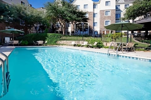 Dive into sparkling water and bask on sunny loungers.