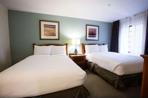 Settle into two plush beds for effortless group comfort.