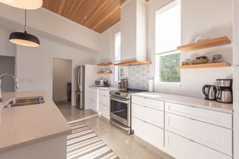 Fully stocked bright kitchen