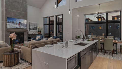 Kitchen, Main Level - Looking into great room and deck access
