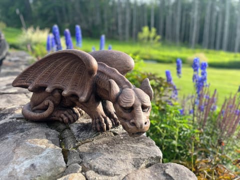 Perennial gardens frame the house and deck