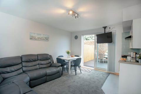 Open plan living space | Garden Apartment - New Esplanade Court, Paignton