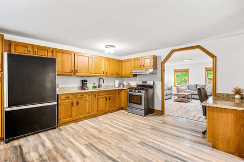 Enjoy a bright, modern space with stylish cabinets and seamless access to the living area!