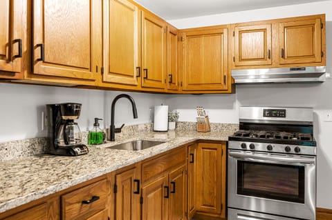 Kitchen: Modern appliances and granite counters for delightful culinary adventures!