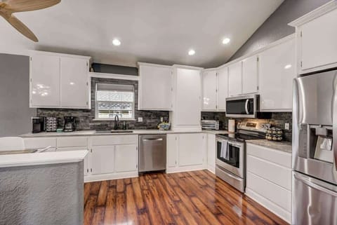 The spacious kitchen is fully stocked and ready for you with all major appliances and most smaller appliances you could hope for!