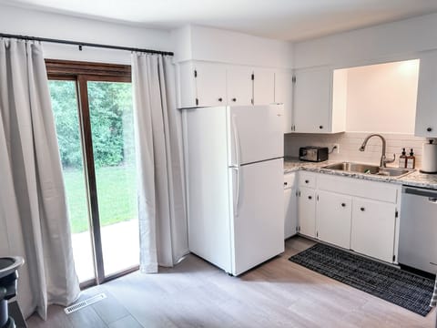 You'll Appreciate the Sun-Drenched Kitchen when Preparing Your Meals