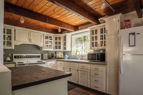 Large kitchen with island to prepare your meals