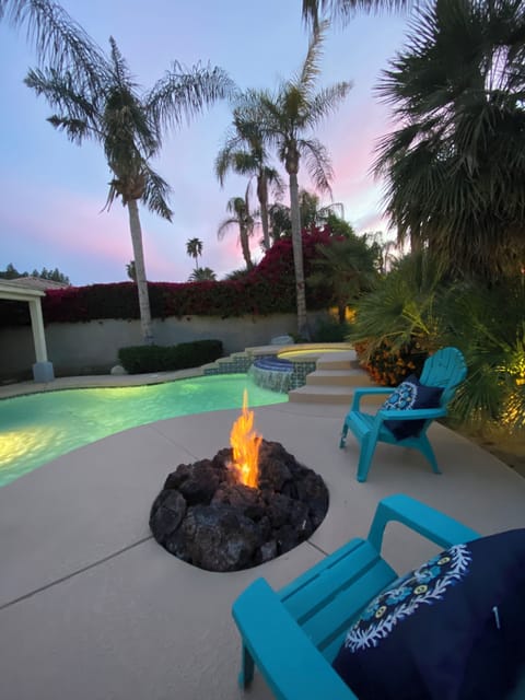 Backyard pool, spa, and firepit