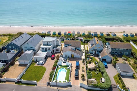 This wonderful beachfront gem with pool awaits!