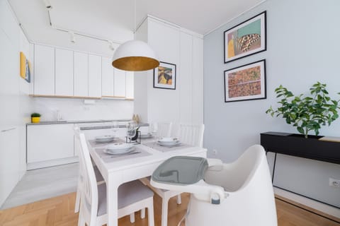 A close-up of the dining space with beautiful table settings and modern decor.
