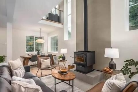 Living room with wood burning fireplace