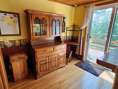Dining area #2 with view of lake and sliding door to deck